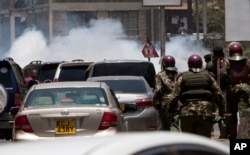 Nairobi motorists were caught unaware as riot police fired tear gas at the National Super Alliance (NASA) protesters as they marched to the IEBC - Independent Electoral and Boundaries Commission offices, in Nairobi, Kenya, Oct. 6, 2017.