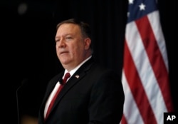 FILE - U.S. Secretary of State Mike Pompeo speaks at an Economic Club of Detroit luncheon in Detroit, June 18, 2018.