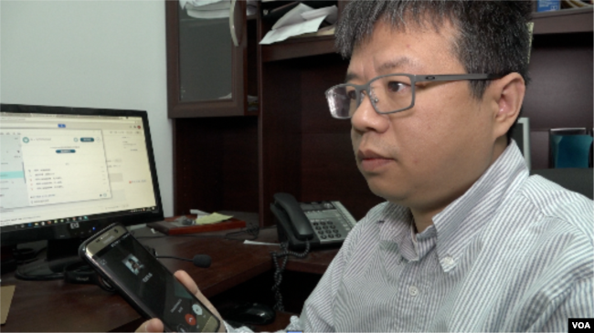 中国劳工观察执行主任李强（章真拍摄）