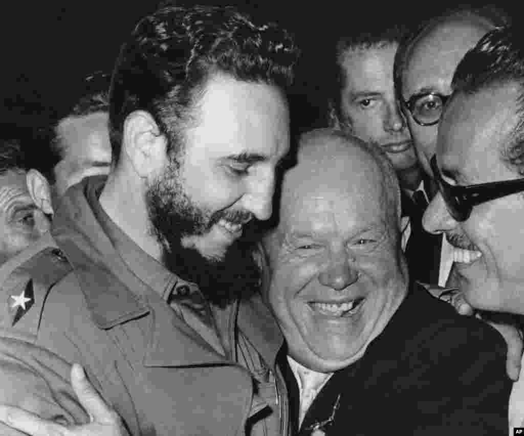 FILE - In a Sept. 20, 1960 file photo, Cuban leader Fidel Castro, left, and Soviet leader Nikita Khrushchev hug at the United Nations. 