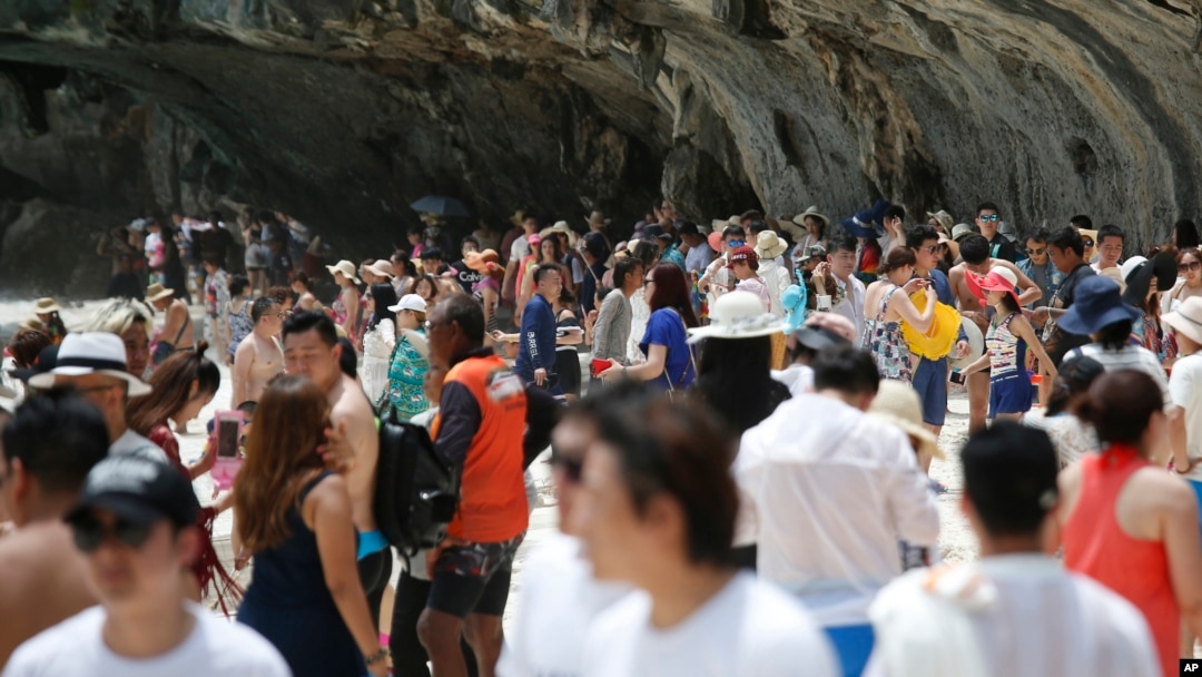 Thailand allows visitors back to beach made famous by movie