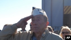 Pearl Harbor survivor Charles Ellis salutes during a Dec. 7, 2008 ceremony marking the anniversary of the attack on Pearl Harbor.