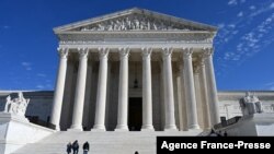 FILE - The U.S. Supreme Court in Washington, Dec. 04, 2021. The court agreed on Jan. 24, 2022, to hear suits alleging that race-conscious admissions policies at Harvard and the University of North Carolina are discriminatory against Asian-American students.