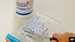 FILE - Deaths from synthetic opioids, including fentanyl, rose 73 percent. Prescription painkillers took the highest toll with deaths from Oxycontin and Vicodin increasing just 4 percent, according to government data.