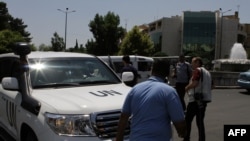 Vozilo UN-a nakon bombaškog napada u Damasku