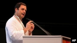 FILE - Indian Congress party president Rahul Gandhi addresses the 48th Congress plenary session in New Delhi, India, Saturday, March 17, 2018.