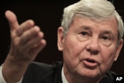 FILE - In this Dec. 11, 2008, file photo, former Florida Sen. Bob Graham testifies on Capitol Hill in Washington, before the Senate Homeland Security and Governmental Affairs Committee.