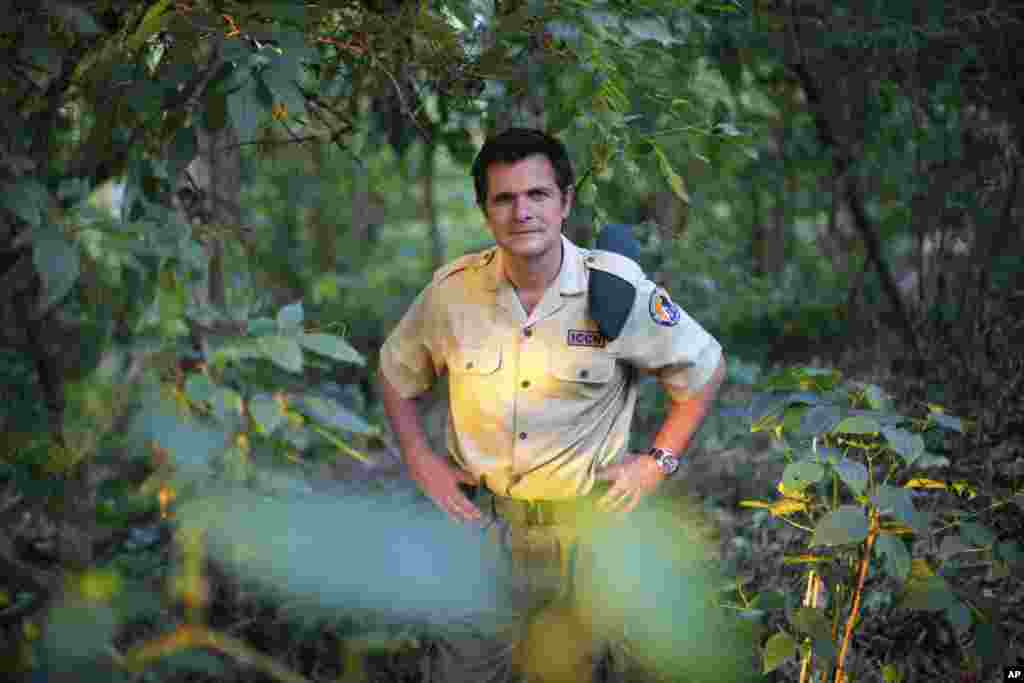 The director of Virunga National Park, Emmanuel de Merode, recently recovered from being shot four times in the chest by gunmen. He believes the park will be central to the economic recovery of the entire region which has been devastated by two decades of militia violence. He posed in the park in 2013 for this photograph.