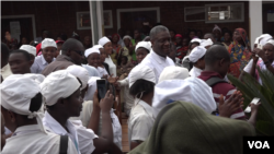 FILE - Denis Mukwege is seen with patients at the the Panzi hospital he runs in Bukavu, eastern DRC. (E. Muhero/VOA)