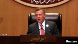 FILE - Jordan's King Abdullah II speaks during the 28th Ordinary Summit of the Arab League at the Dead Sea, Jordan, March 29, 2017. 