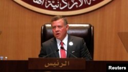 FILE - Jordan's King Abdullah II speaks during the 28th Ordinary Summit of the Arab League at the Dead Sea, Jordan, March 29, 2017.