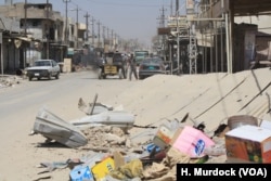 Areas around Old Mosul, are slowly being repopulated, but many places are entirely without electricity, running water and other city services, like trash collection, Aug. 27, 2017.