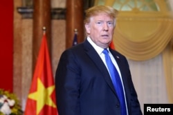 President Donald J. Trump enters the Presidential Palace to meet with Vietnamese President Nguyen Phu Trong in Hanoi, Vietnam, Feb. 27, 2019, ahead of the second summit between Trump and North Korean leader Kim Jong-un.