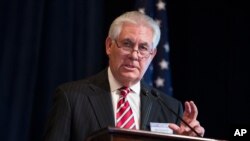 FILE - ExxonMobil CEO Rex Tillerson delivers remarks on the release of a report by the National Petroleum Council on oil drilling in the Arctic, March 27, 2015, in Washington.