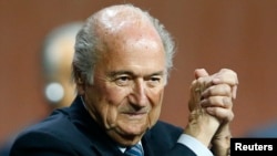 FIFA President Sepp Blatter gestures after he was re-elected at the 65th FIFA Congress in Zurich, Switzerland, May 29, 2015.