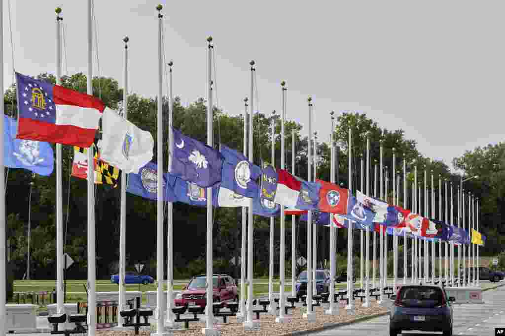 State flags fly at half staff at the entrance to Offutt AFB near Bellevue, Nebraska, Sept. 19, 2020, in memory of Supreme Court Justice Ruth Bader Ginsburg.