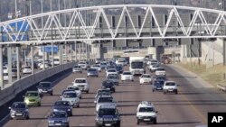 Cars on a road to Pretoria, South Africa.