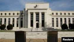 FILE - The Marriner S. Eccles Federal Reserve Board Building in Washington houses the main offices of the Federal Reserve System's Board of Governors.