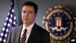 FILE - FBI Director James Comey says the Islamic State group was encouraging would-be homegrown terrorists to act and that some of those arrested had been communicating with the militants through encrypted message platforms.