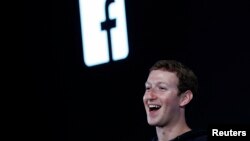 FILE - Mark Zuckerberg, Facebook's co-founder and chief executive introduces 'Home' a Facebook app suite during a Facebook press event in Menlo Park, California, April 4, 2013. 