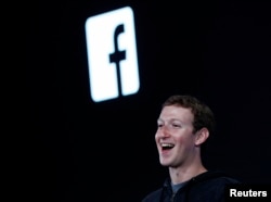 Mark Zuckerberg introduces 'Home' a Facebook app suite during a press event in Menlo Park, California, Apr. 4, 2013.