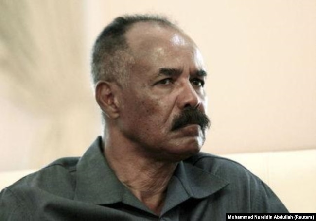 FILE - Eritrea's President Isaias Afwerki listens during his official visit in Khartoum, June 11, 2015.