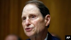  In this June 28, 2018, file photo, Sen. Ron Wyden, D-Ore., ranking member of the Senate Finance Committee, speaks during a hearing on the nomination of Charles Rettig for IRS Commissioner on Capitol Hill in Washington.