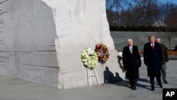President Donald Trump and Vice President Mike Pence visit the Martin Luther King Jr. Memorial, in Washington, Jan. 21, 2019.