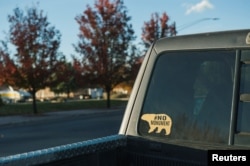 A vehicle displays a sticker opposing the Bears Ears National Monument in Blanding, Utah, Oct. 31, 2017.