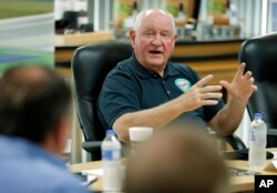 FILE - U.S. Agriculture Secretary Sonny Perdue speaks during a roundtable discussion in Ames, Iowa, Aug. 30, 2018.