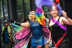 A band performs during the Brooklyn Pride event in the Brooklyn borough of New York City, U.S., June 13, 2021. REUTERS