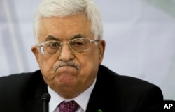 FILE - Palestinian President Mahmoud Abbas says he'll regard the Israeli election winner as 'our partner.'