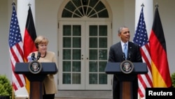 Tổng thống Mỹ Barack Obama và thủ tướng Đức Angela Merkel trong một cuộc họp báo chung ở Vườn Hồng, Tòa Bạch Ốc, thủ đô Washington 2/5/2014.