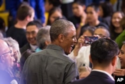 President Barack Obama greets members of the audience after delivering remarks at Kotzebue School, Wednesday, Sept. 2, 2015.
