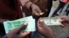 Zimbabweans Find Creative Solutions to Cash Crisis