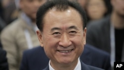 FILE - Wang Jianlin, chairman of Wanda Group, smiles at the Ninth Asian Financial Forum in Hong Kong, Jan. 18, 2016.