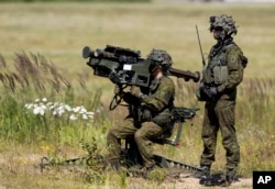 Lithuania's soldiers take part in the NATO multinational ground-based air defense units exercise "Tobruq Legacy 2017" at the Siauliai airbase in Lithuania, July 20, 2017.