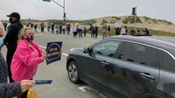 People rally to reopen the Great Highway to vehicles again in San Francisco, on May 1, 2021. (AP Photo/Janie Har)
