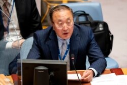 FILE - Zhang Jun, permanent representative of China to the United Nations, speaks during a meeting of the Security Council, Sept. 23, 2021, in New York.