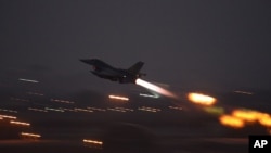 FILE - In an image provided by the U.S. Air Force, an F-16 Fighting Falcon takes off from Incirlik Air Base, Turkey, Aug. 12, 2015, to launch airstrikes against Islamic State targets in Syria.