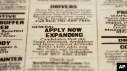 Classified section of Boston Herald calls attention to possible employment opportunities, Dec. 11, 2012.