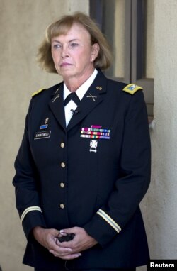 Retired Army Colonel Sheri A. Swokowski looks on during the U.S. Navy's Fleet Readiness Center Southwest's first LGBT pride event in San Diego, Calif., June 30, 2015. Swokowski is the highest-ranking openly transgender veteran in the country.