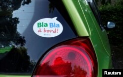 A sticker of French ride-sharing start-up BlaBlaCar is seen on a car May 27, 2017 at Le Coudray-Montceaux, near Paris, France.