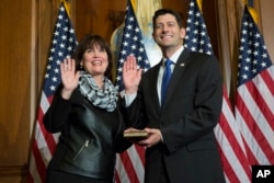 House Speaker Paul Ryan of Wis. administers the House oath of office to Rep. Betty McCollum, D-Minn., during a mock swearing in ceremony on Capitol Hill in Washington, Jan. 3, 2017.