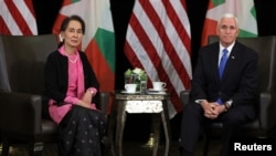 Myanmar's State Counsellor Aung San Suu Kyi and U.S. Vice President Mike Pence hold a bilateral meeting in Singapore, November 14, 2018.