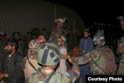 Detainees from Taliban prisons in Helmand province are transferred to an Afghan army facility for interrogation. (MOD)