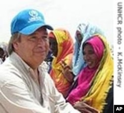 U.N. High Commissioner for Refugees Antonio Guterres greets refugees from Sudan.