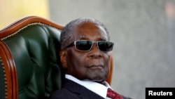 Robert Mugabe yahoze ari perezida wa Zimbabwe mu kiganiro n'abanyamakuru ku kirimba ciwe cataziriwe "Blue Roof" i Harare, Zimbabwe, Kw'itariki 29/07/2018.