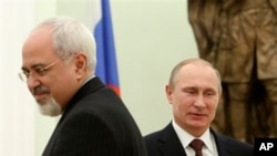 Russian President Vladimir Putin, right, and Iranian Foreign Minister Mohammad Javad Zarif, at the Kremlin in Moscow, Jan. 16, 2014.