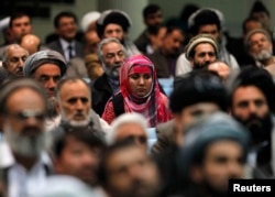 FILE - Participants of a jirga are seen during a session in Kabul, Afghanistan, Nov. 24, 2013.